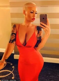 Amber Rose Shares Sexy Snaps in Figure-Hugging Red Dress and