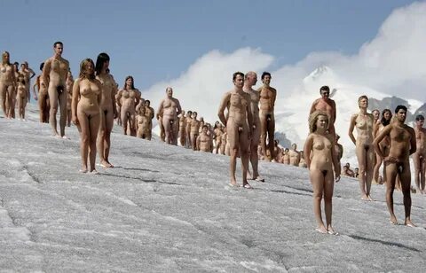 Naked volunteers stand atop Aletsch glacier, - Album Photo V