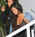 Kourtney Kardashian shows off nipples in lingerie top and se