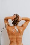 Woman Shampooing Her Hair and Taking a Bath - Free Stock Pho