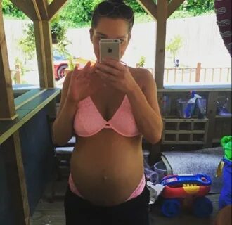 Pregnant Helen Flanagan shows off her baby bump in a bikini 