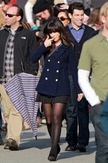 Zooey Deschanel upskirt while cycling in mini skirt & pantyh