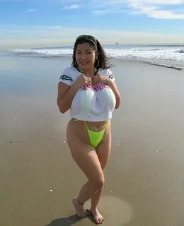 Plump Latina Wearing Green Suspender Swimsuit - Nuded Photo