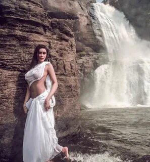 Classic. by @ag.shoot .#bollywood #whitesaree #wetlook #waterfall #actor #m...