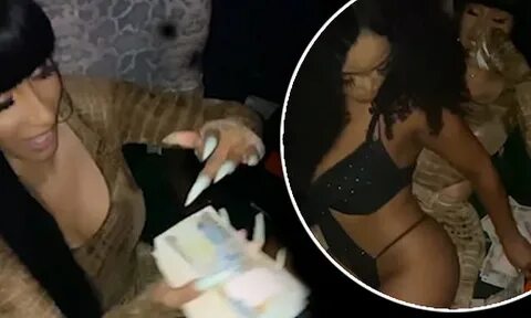 Cardi B twerks on naked exotic dancers and showers them with
