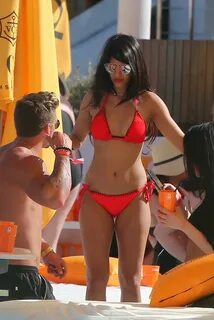 Jasmin Walia in Red Bikini Parties in Ibiza GotCeleb