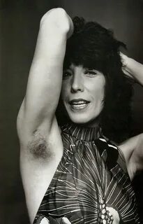 Lily Tomlin photographed with hairy underarm by Annie Leibov