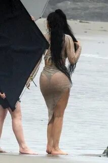 kylie jenner sizzles in a sheer outfit during beach photosho