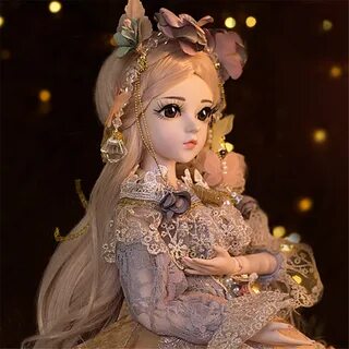 Кукла шарнирная с коричневыми глазами и одеждой 60 см Куклы