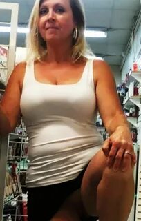Blonde yo milf challenges In sex shop. - Mature Porn Photo