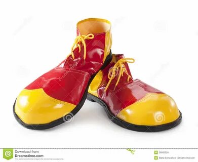 Красные и желтые ботинки клоуна Стоковое Фото - изображение насчитывающей маслен