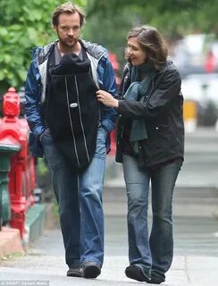 Maggie Gyllenhaal and husband Peter Sarsgaard take a stroll 
