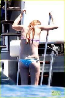 Lindsay Lohan Hangs Out on a Yacht in a Bikini with Her Sist