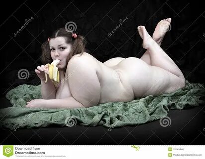 Overweight Woman Eating Fresh Ripe Bananas. Stock Photo - Im