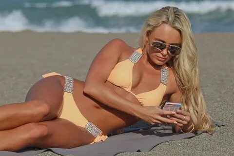 AMBER TURNER in Bikini on the Beach in Marbella 05/26/2017 -