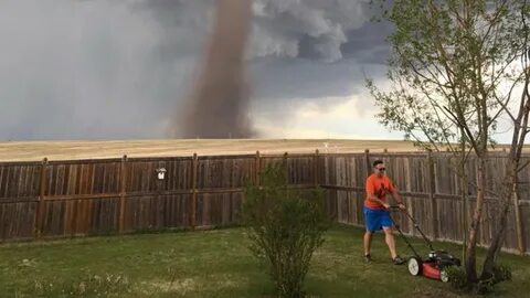 Pic of Man Defying Tornado Reaps Rewards - Videos from The W