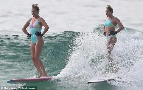 Stephanie Gilmore almost falls out of her swimsuit while rid