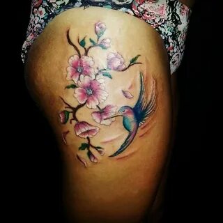 cherry blossom flowers and humming bird tattoo, thigh piece,