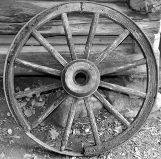 Old wagon wheel work A Photograph by David Lee Thompson Fine