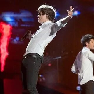Harry I think those jeans are a bit tight... One direction h