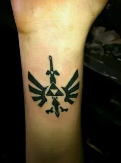 Zelda Triforce - Hylian crest - Master Sword arm tattoo #Zel