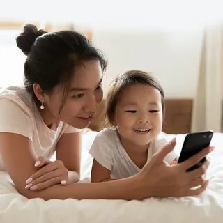 Asian adopted girl talking to mom