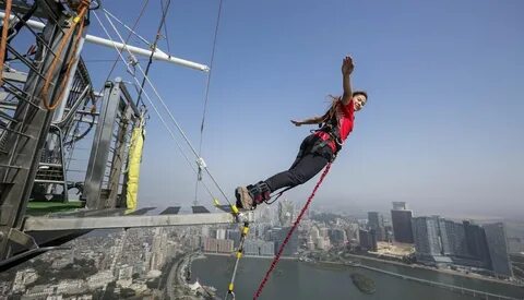 Bungee jumping at AJ Hackett Macau Tower - Living + Nomads -