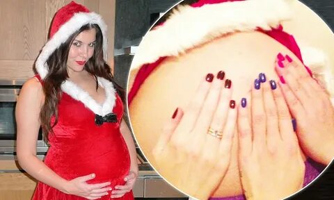 Imogen Thomas dresses as a sexy Mrs Claus to show off her bu