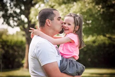 Father Hugging And Kissing Her Daughter by Lea Csontos