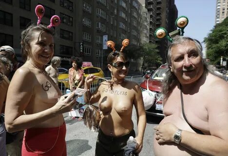 Hundreds of women march naked through New York to call for w