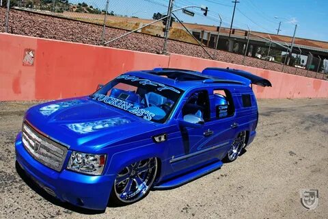 Dropped Royal Blue Chevy Tahoe on Color Matched Wheels - CAR