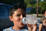 Boy in sunglasses water in bottle free image download