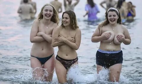 St Andrews skinny dip: Students strip off for traditional Ma
