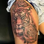 Skin Deep Tales : Photo Tiger tattoo thigh, Rose tattoos for