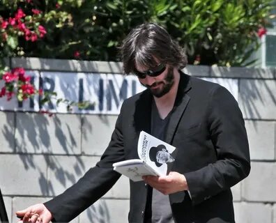 Keanu Reeves Photos Photos - Keanu Reeves Out With A New Mys