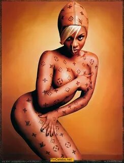 Lil Kim nude cover her breasts and pussy