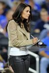 CBS sportscaster, Tracy Wolfson, takes notes during a game b