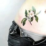 Be a delicate darling with a gardenia flower tattoo