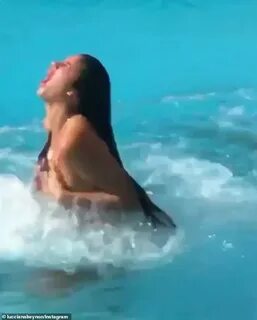 Lucciana Beynon's skimpy bikini top falls off as she jumps i