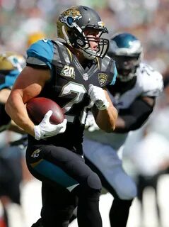 Toby Gerhart - Toby Gerhart Photos - Jacksonville Jaguars v 