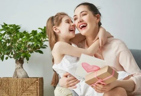 Daughter is Congratulating Mom Stock Photo - Image of childh