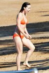 Olivia wilde busty in skimpy orange bikini at the beach Holl