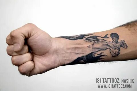 Bruce Lee realistic punch. Tattoo on forearm. Hulk tattoo, T