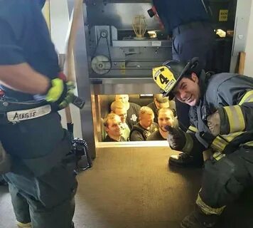 Fire Fighters Find Group Of Cops Stuck In Elevator . . Stop 