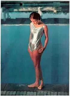 1969 Sports Illustrated Swimsuit. Erin Gray shimmers in alum