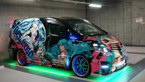 Japanese Anime Cars Anime-Wrapped Low-Riding Toyota Van with