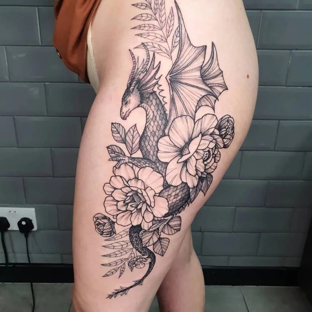 Flesh Tattoo в Instagram: "Amazing flowery dragon thigh piece from @ha...