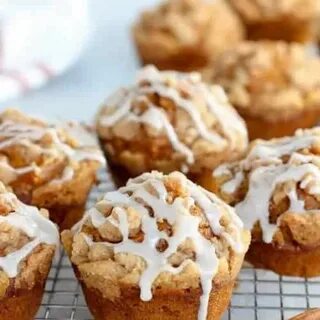 Moist and tender spiced Pumpkin Muffins topped with a butter