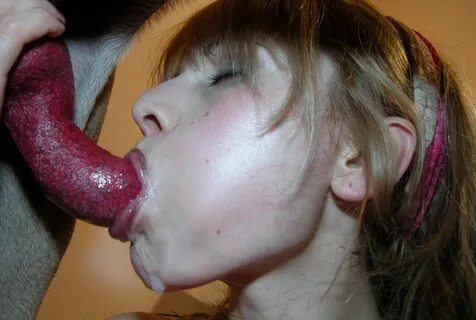 Woman lets dog cum on her
