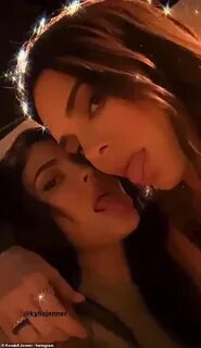 Kylie Jenner and her sister Kylie lark around at a party Dai